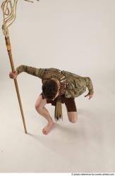 KEETA KNEELING POSE WITH SPEAR